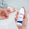 Photo of hands showing the texture of the product.