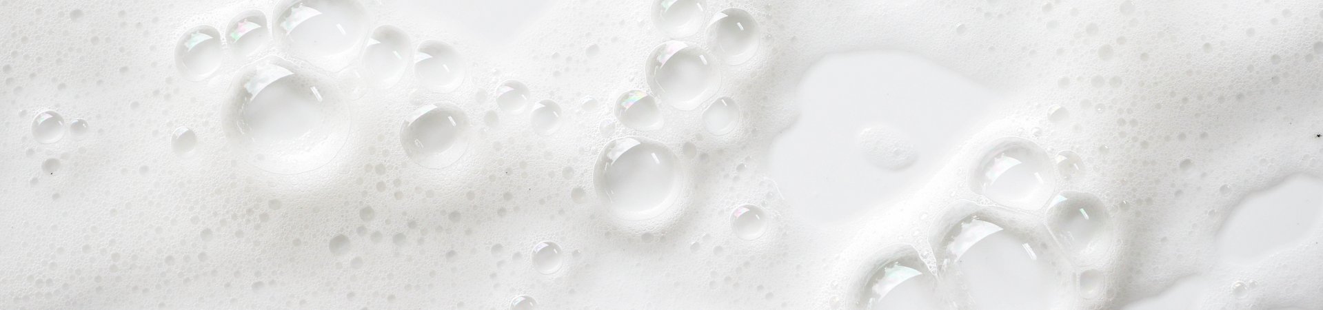Witte schuim op witte achtergrond
