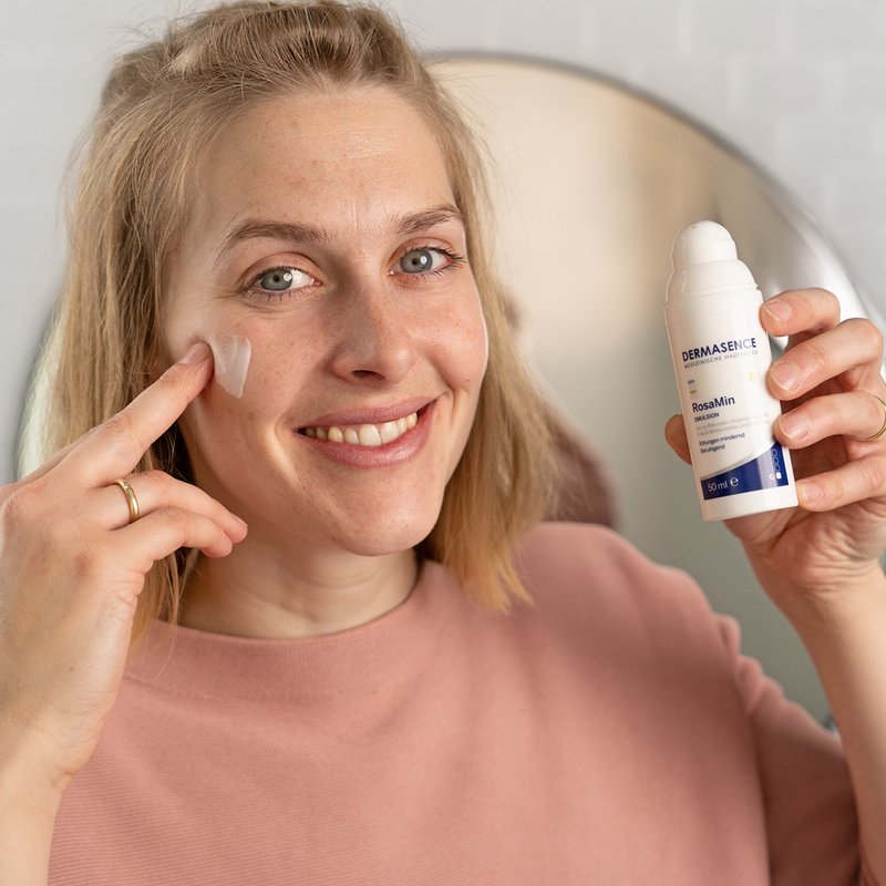 Photo of a woman applying the product.