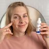 : Photo of a woman applying the product.