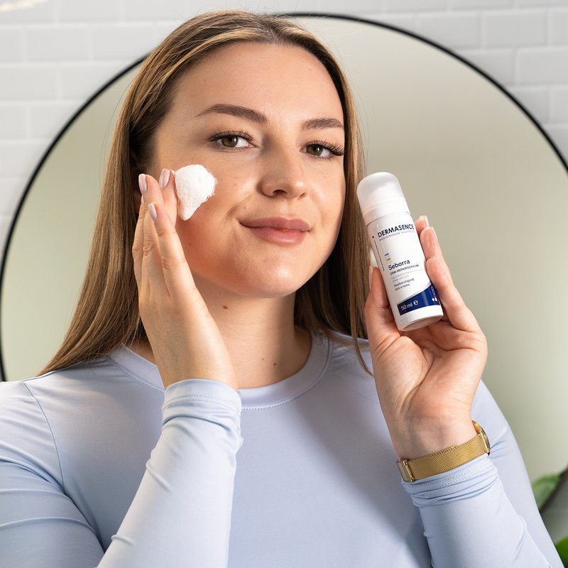Photo of a woman applying the product.