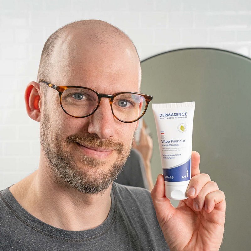 Photo of a man applying the product.