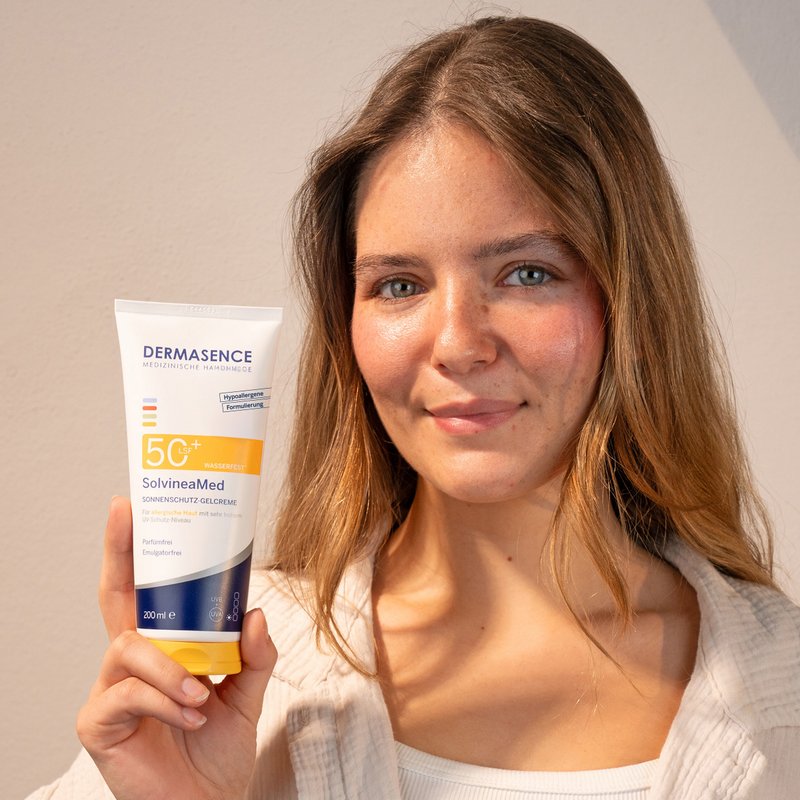 Photo of a woman applying the product.