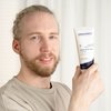 Photo of a man applying the product.