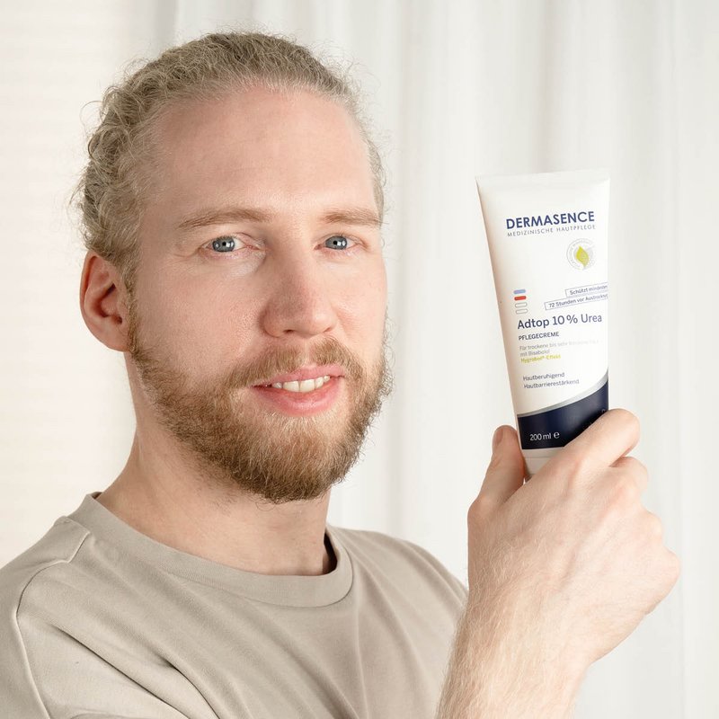 Photo of a man applying the product.