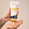 Photo of hands showing the texture of the product.