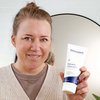 Photo of a woman applying the product.