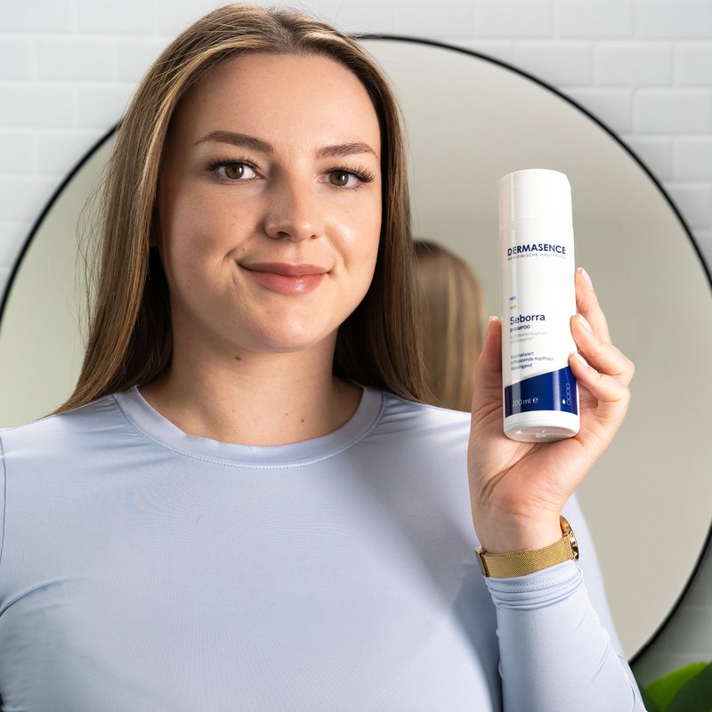 Photo of a woman applying the product.